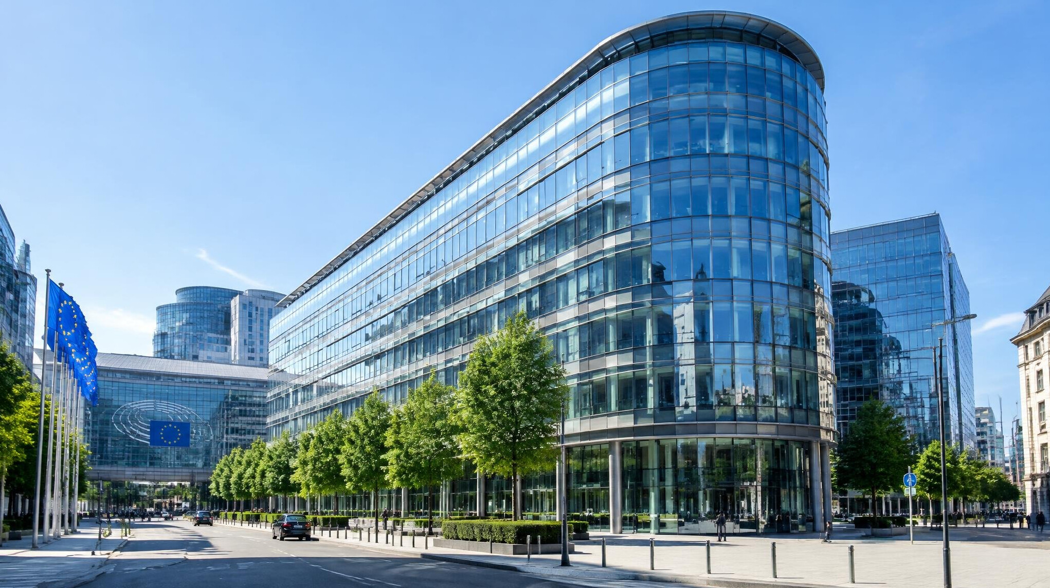 View of a modern glass office building in a European business district